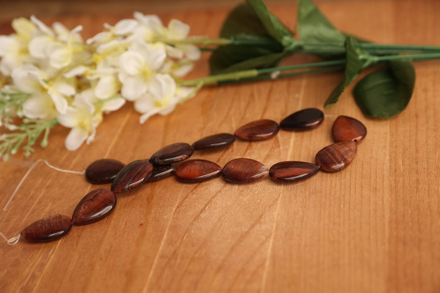 Red Tiger Eye Teardrop Beads — 25 × 17.5 mm
Approx. 13.5” strand