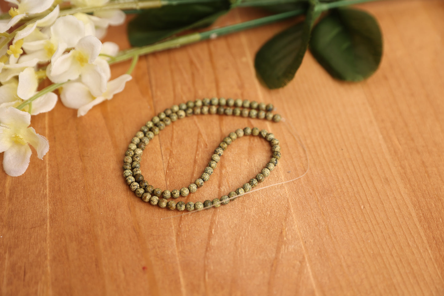 3.8mm unknown round bead