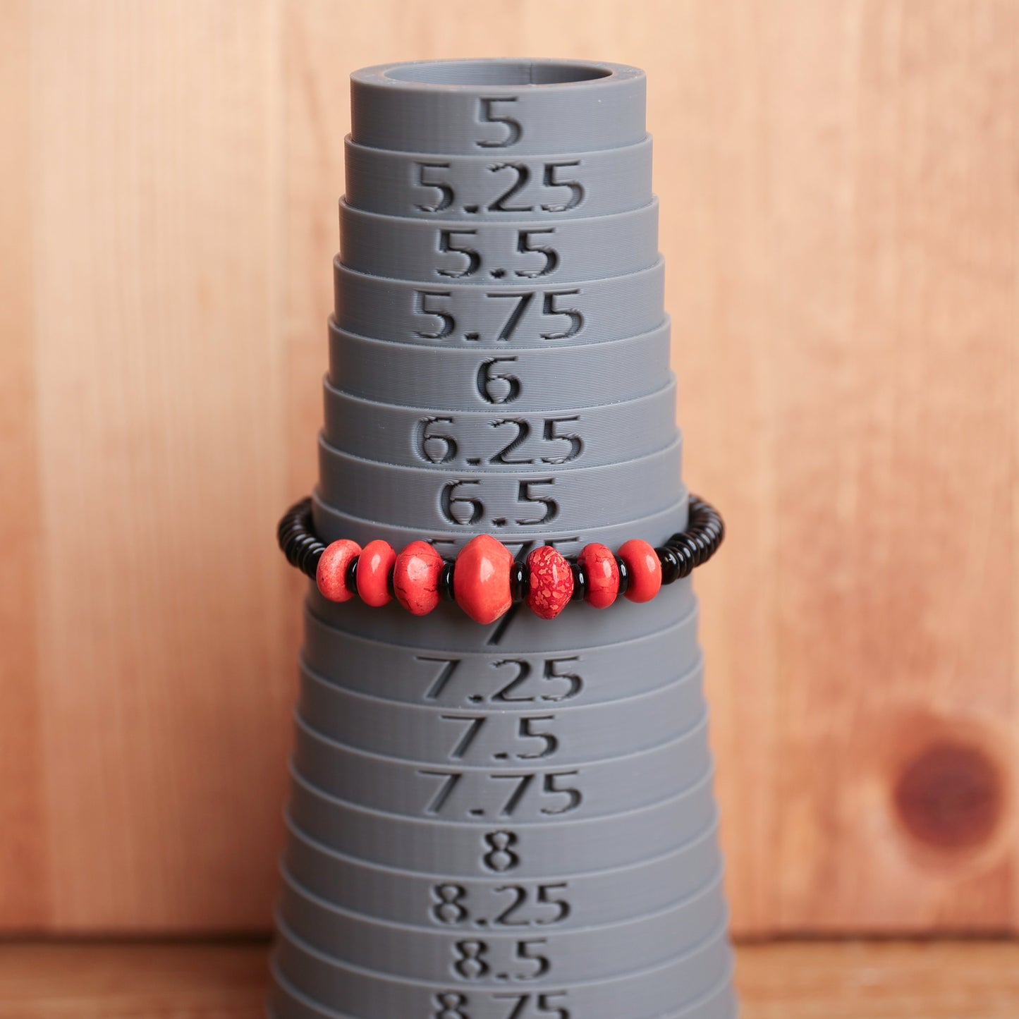 Red Dyed Graduated stone with Obsidian Disks