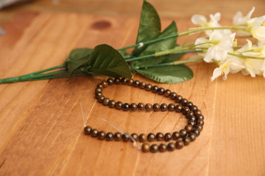Bronzite Faceted Round 8mm