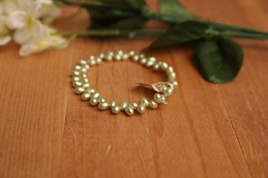Green Freshwater Pearl Teardrops – approx. 5×7mm – Half Strand