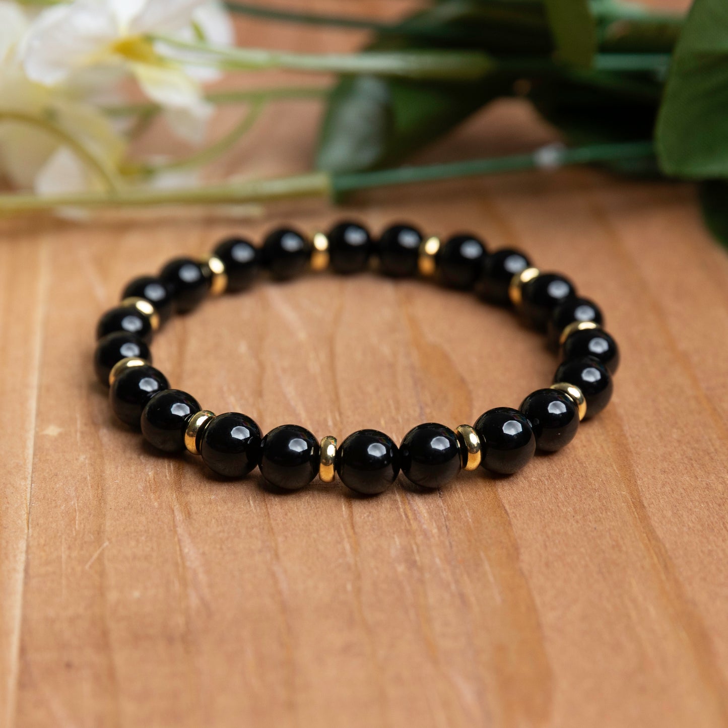 Onyx w/Gold Plated Spacers - 6.75 unstretched