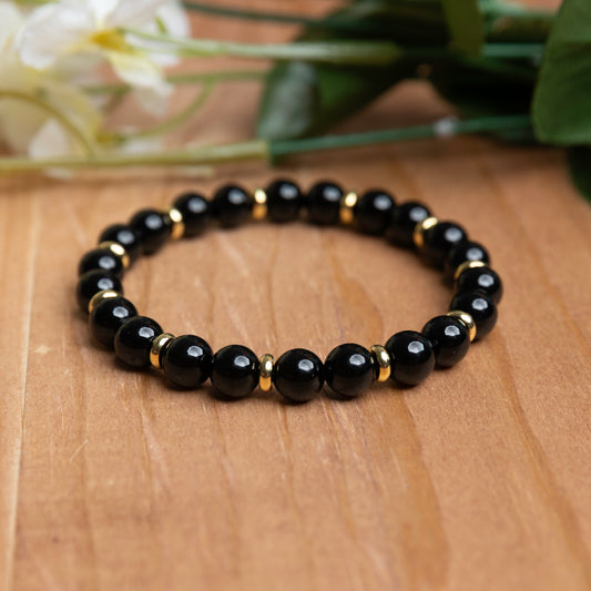 Onyx w/Gold Plated Spacers - 6.75 unstretched
