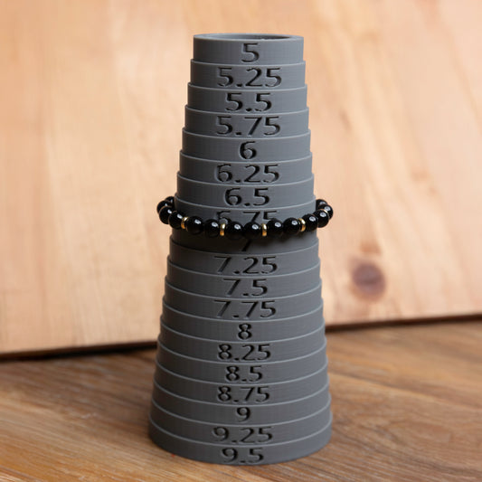Onyx w/Gold Plated Spacers - 6.75 unstretched