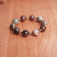 Pyrite, Hematite spacers and Petrified Wood